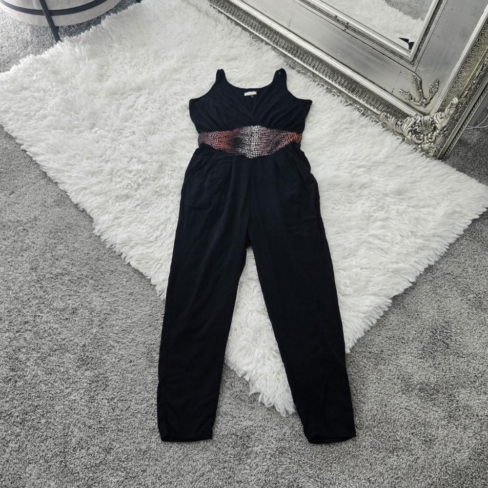 silence + noise Black Jumpsuit. Pockets and side zipper. Size 4. Good preowned c